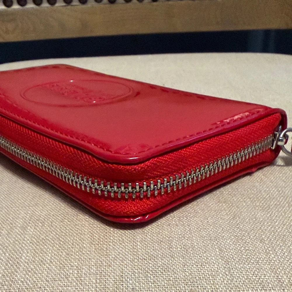 Guess features embossed